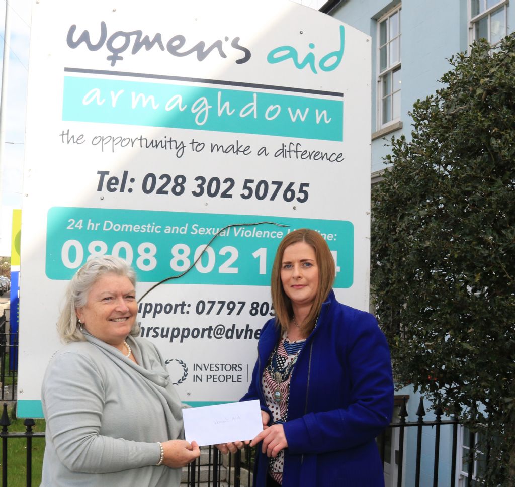 photo 1 cheque to womens aid